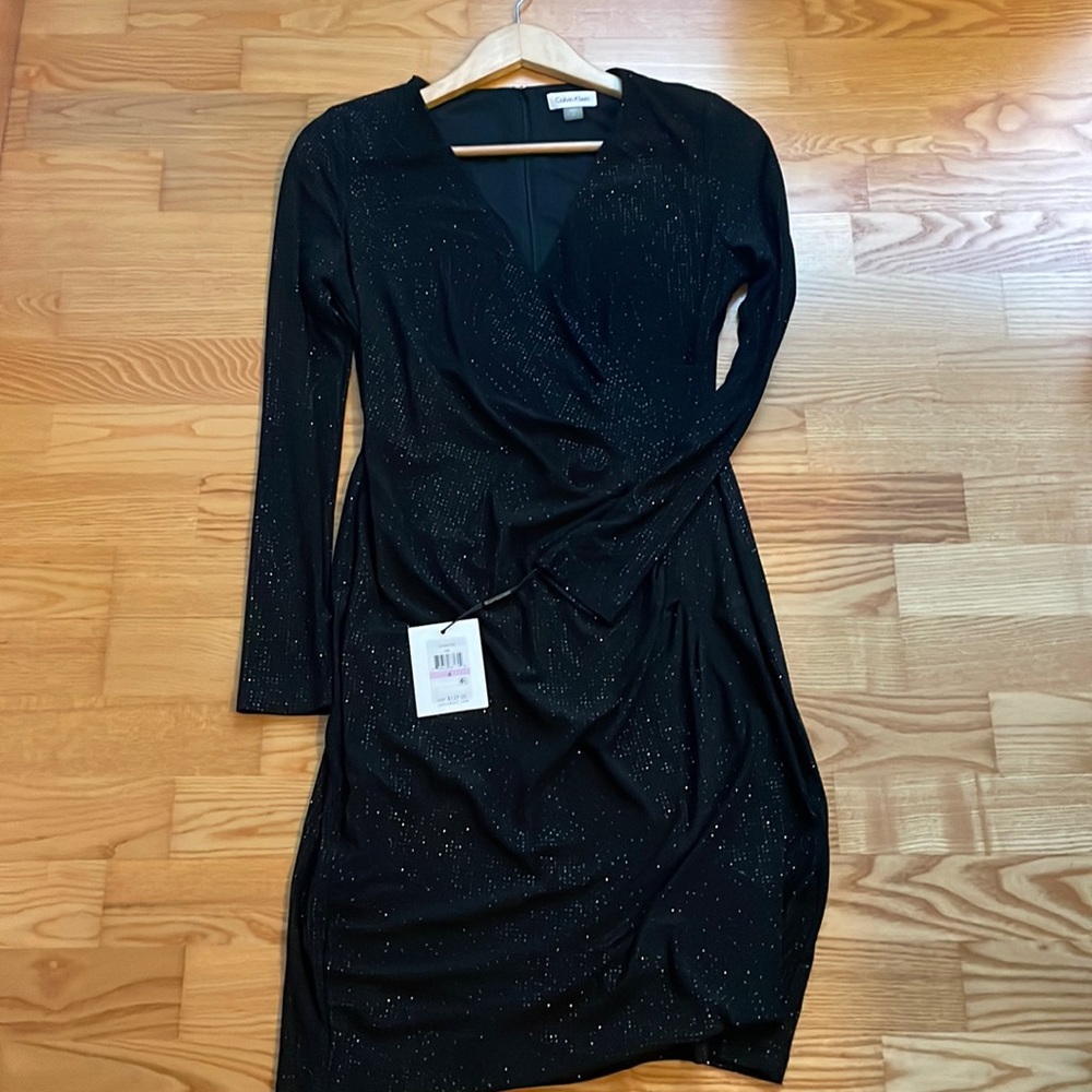 Calvin Klein long sleeved glittery tight dress. Size 6